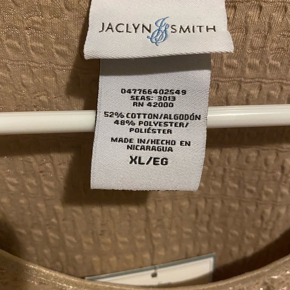 XL top, never worn, tags intact.